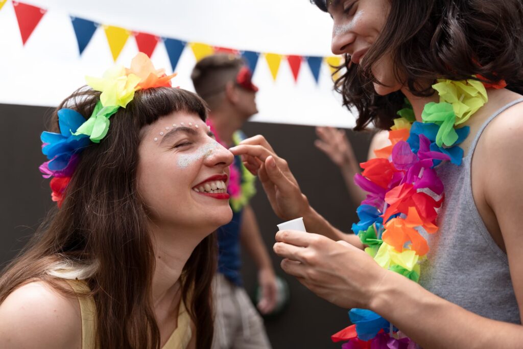 Amigas se arrumando para o Carnaval 2026 com dicas de viagem do Clube Bancorbrás